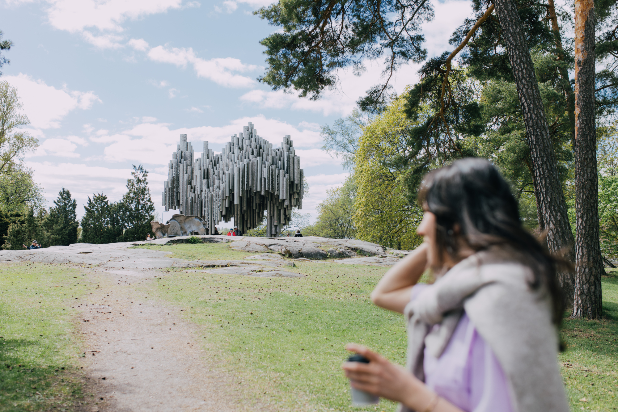 Woman enjoying spring in Sibelius Park in Töölö one of Helsinki's top attractions